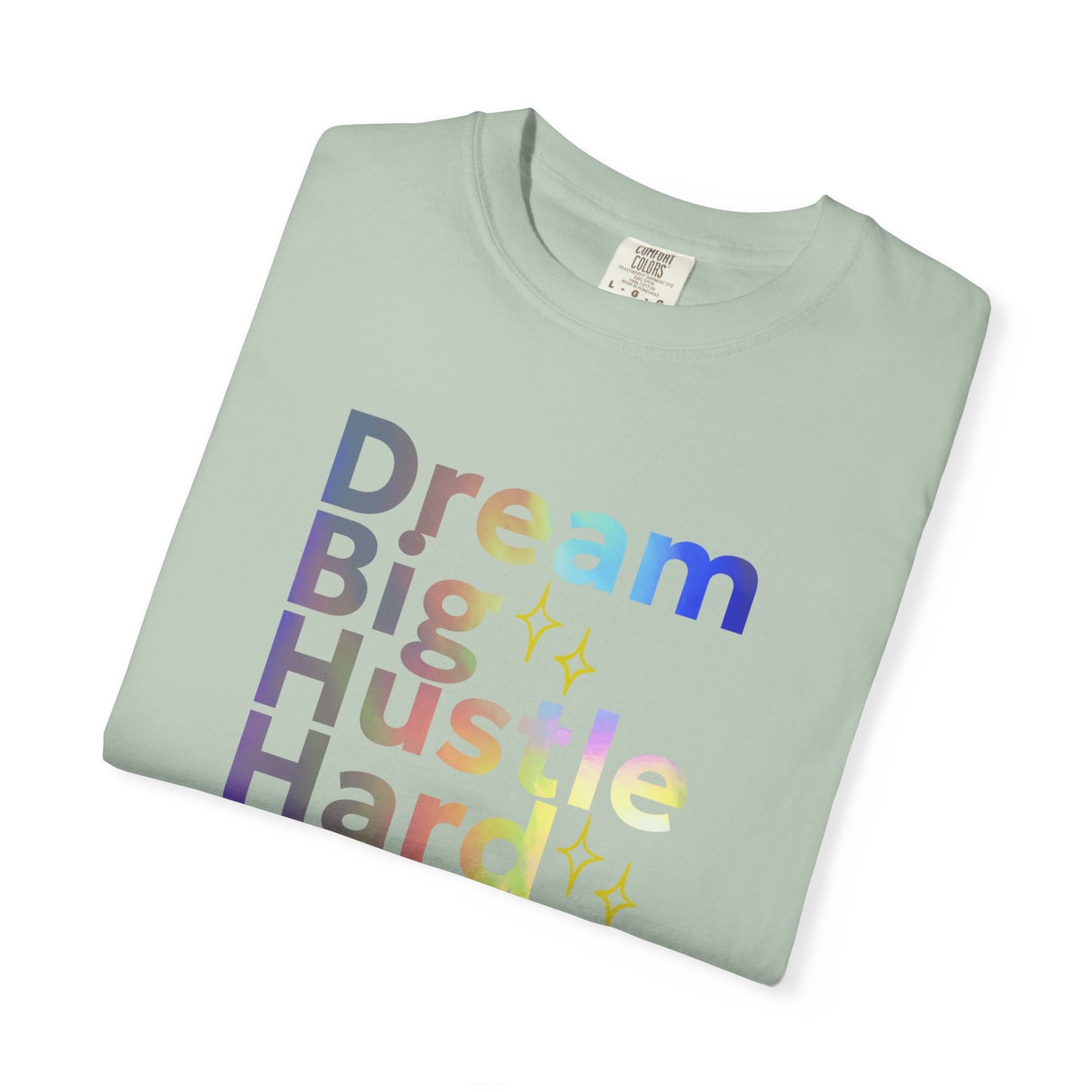 Folded light green t-shirt with colorful text on a white background