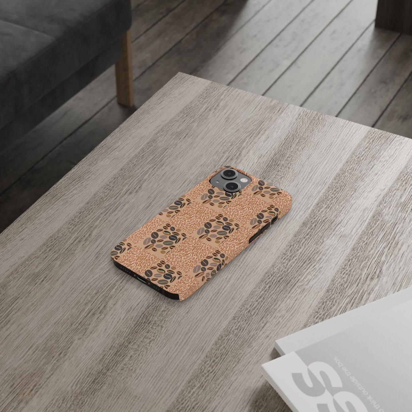 Phone case with floral pattern on wooden table