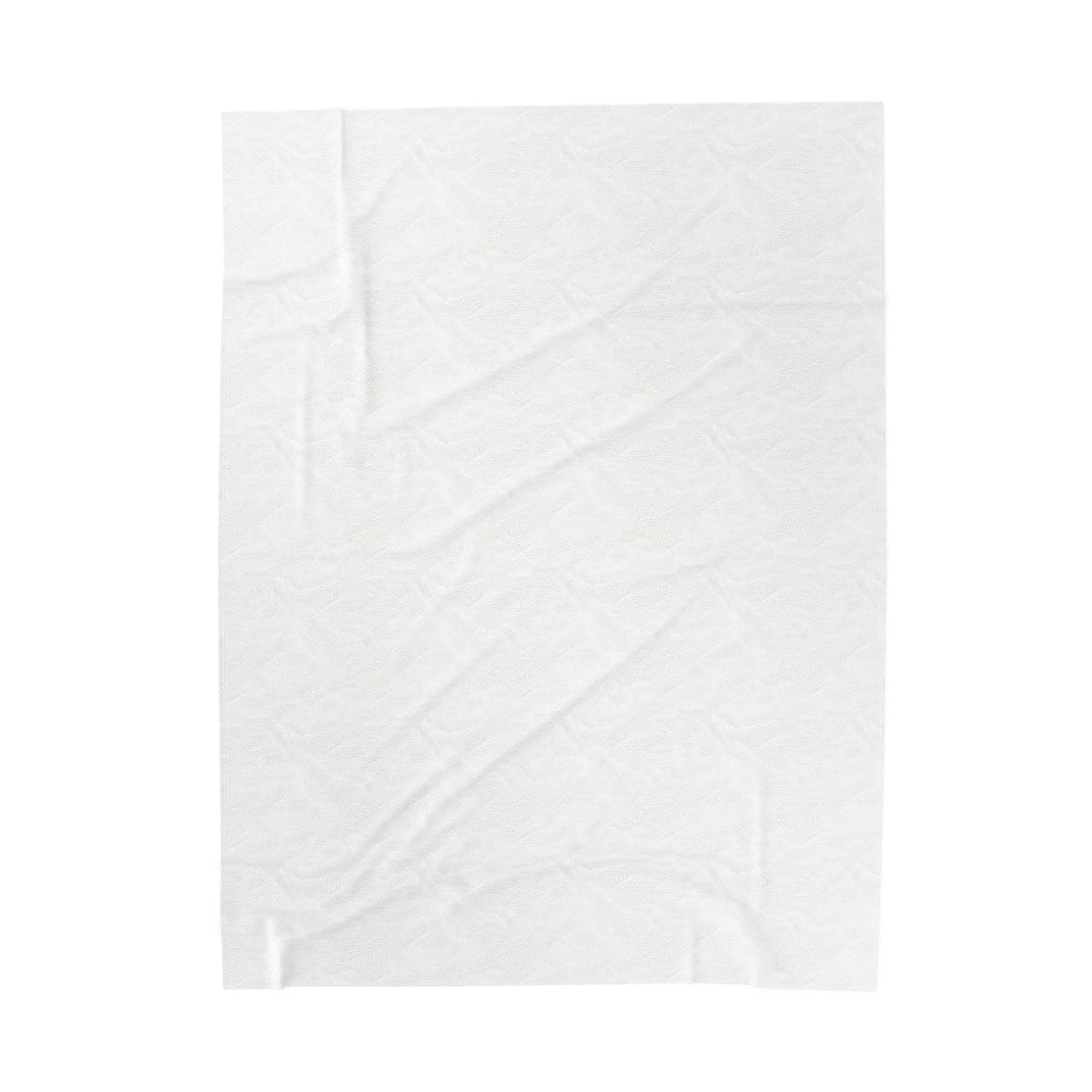 White quilt with geometric pattern on a white background
