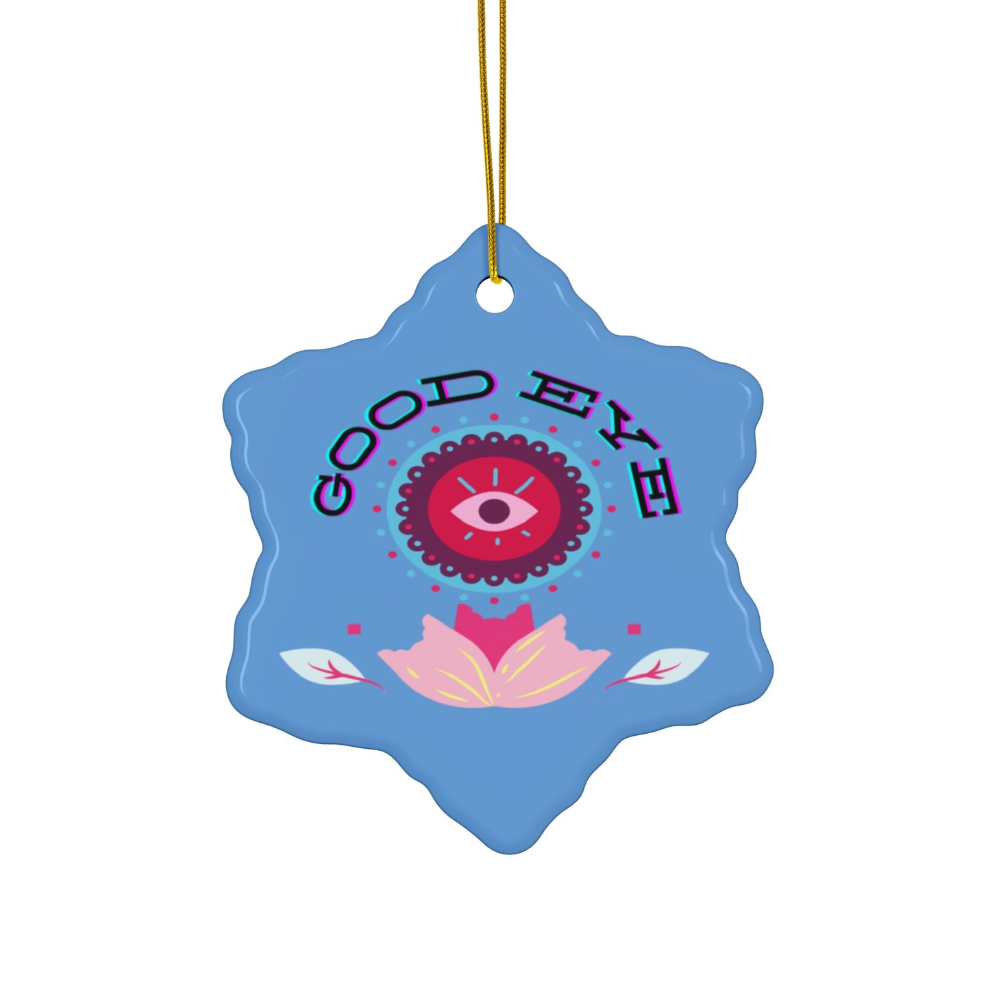 A blue ceramic ornament with a colorful floral design and the text 'GOOD EYE' at the top.