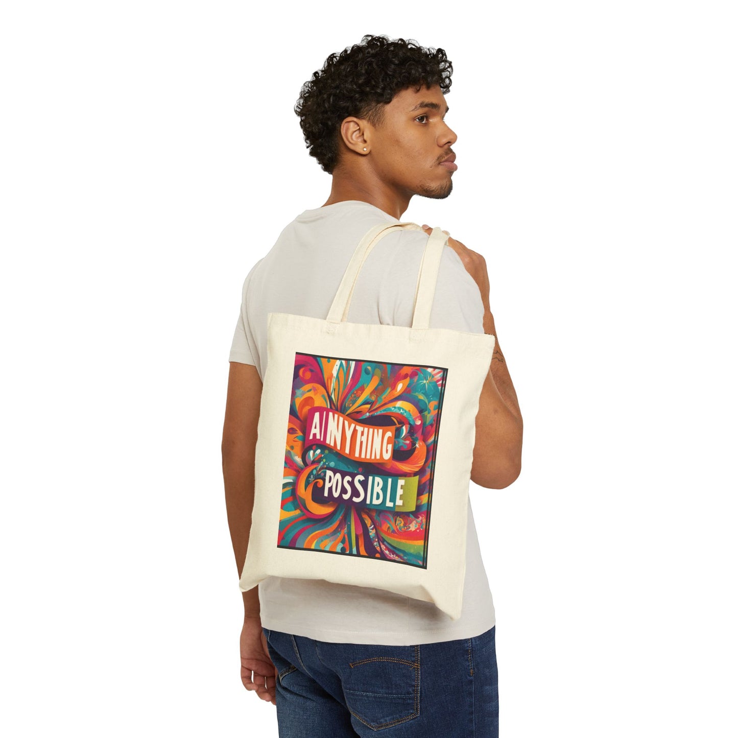 Person carrying a tote bag with a colorful design and text.