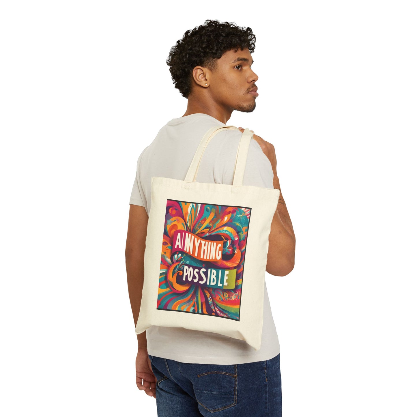 Person carrying a tote bag with a colorful design and text.