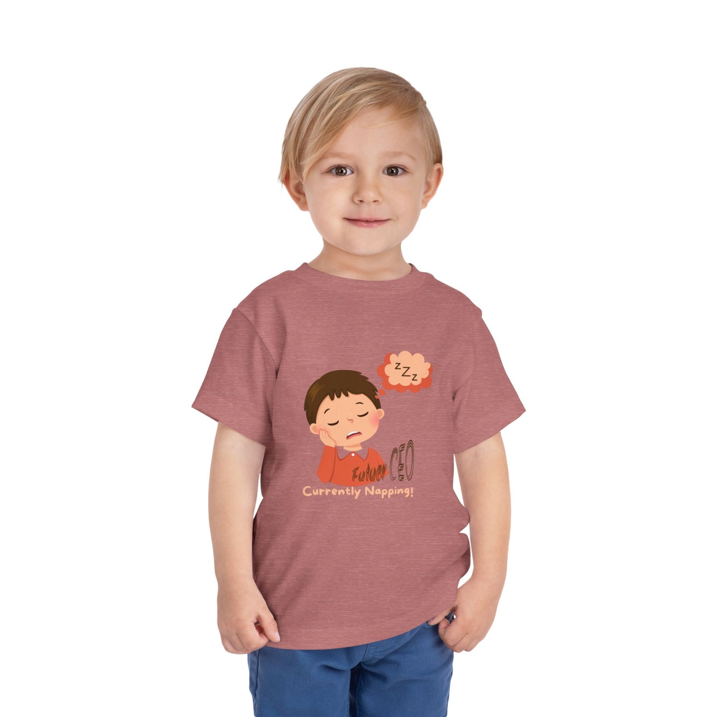 Child wearing a t-shirt with a cartoon design on a white background