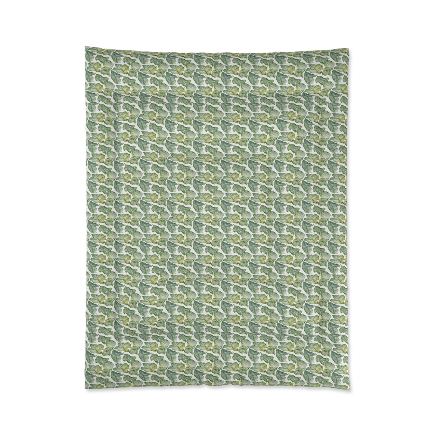 A comforter with a geometric pattern in shades of green and white, displayed against a white background.