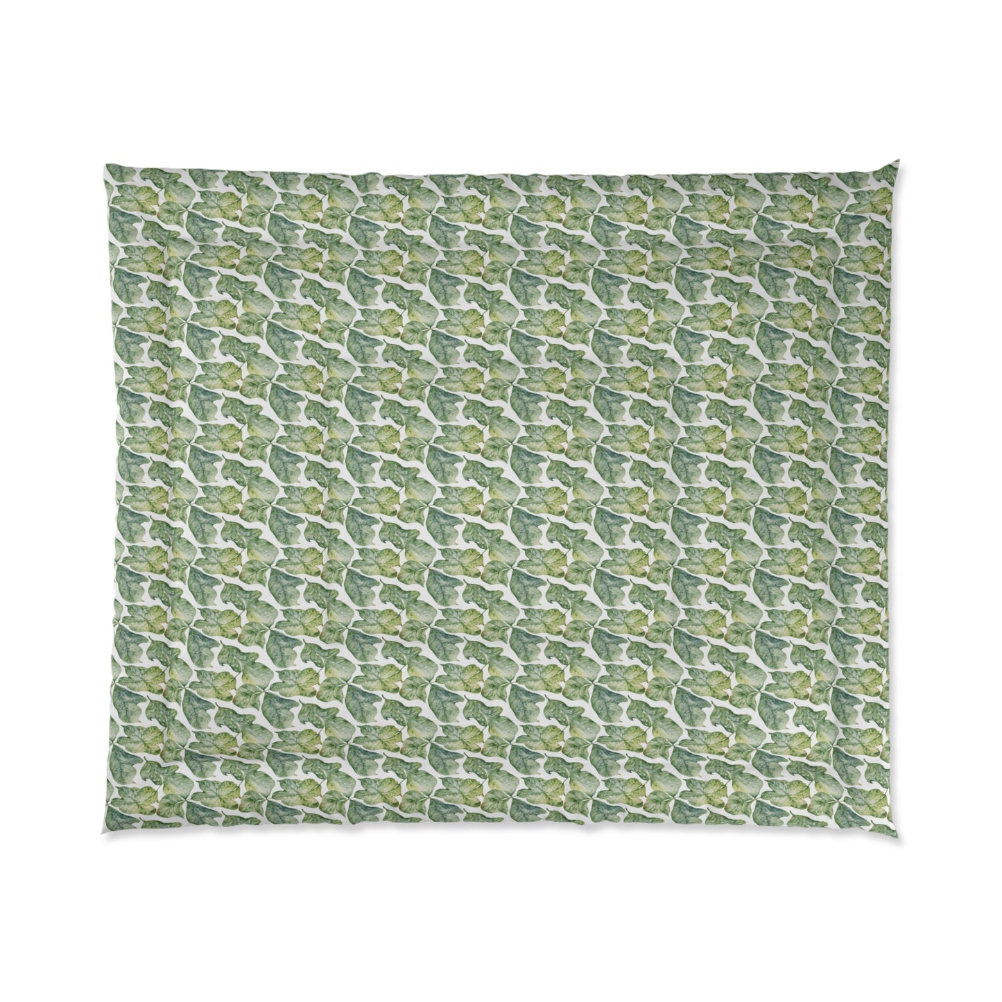 A comforter with a geometric pattern in shades of green and white, displayed against a white background.