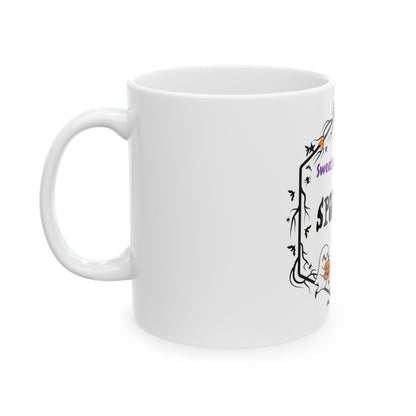 A white ceramic mug with a black gothic-style decorative border graphic and stylized text on the side, shown against a plain white background.