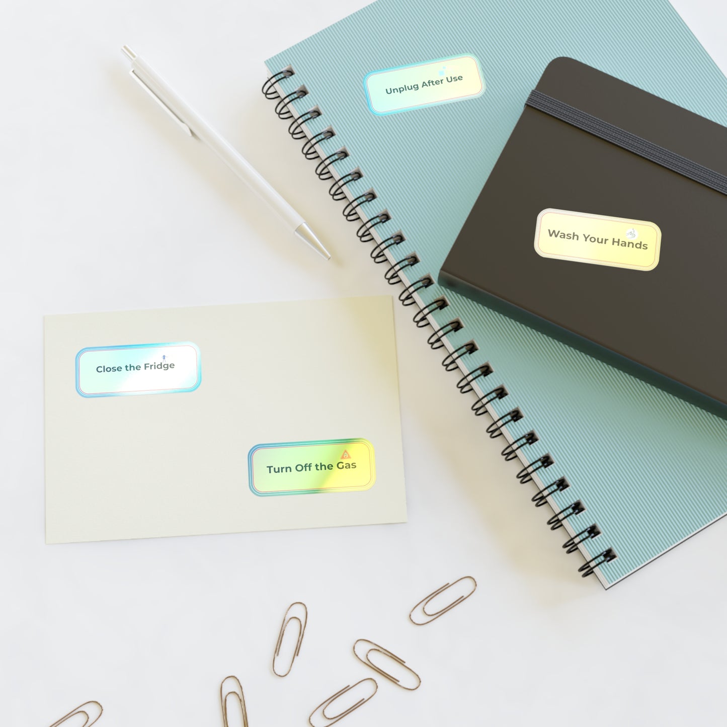 Notebooks with reminder stickers on a light surface