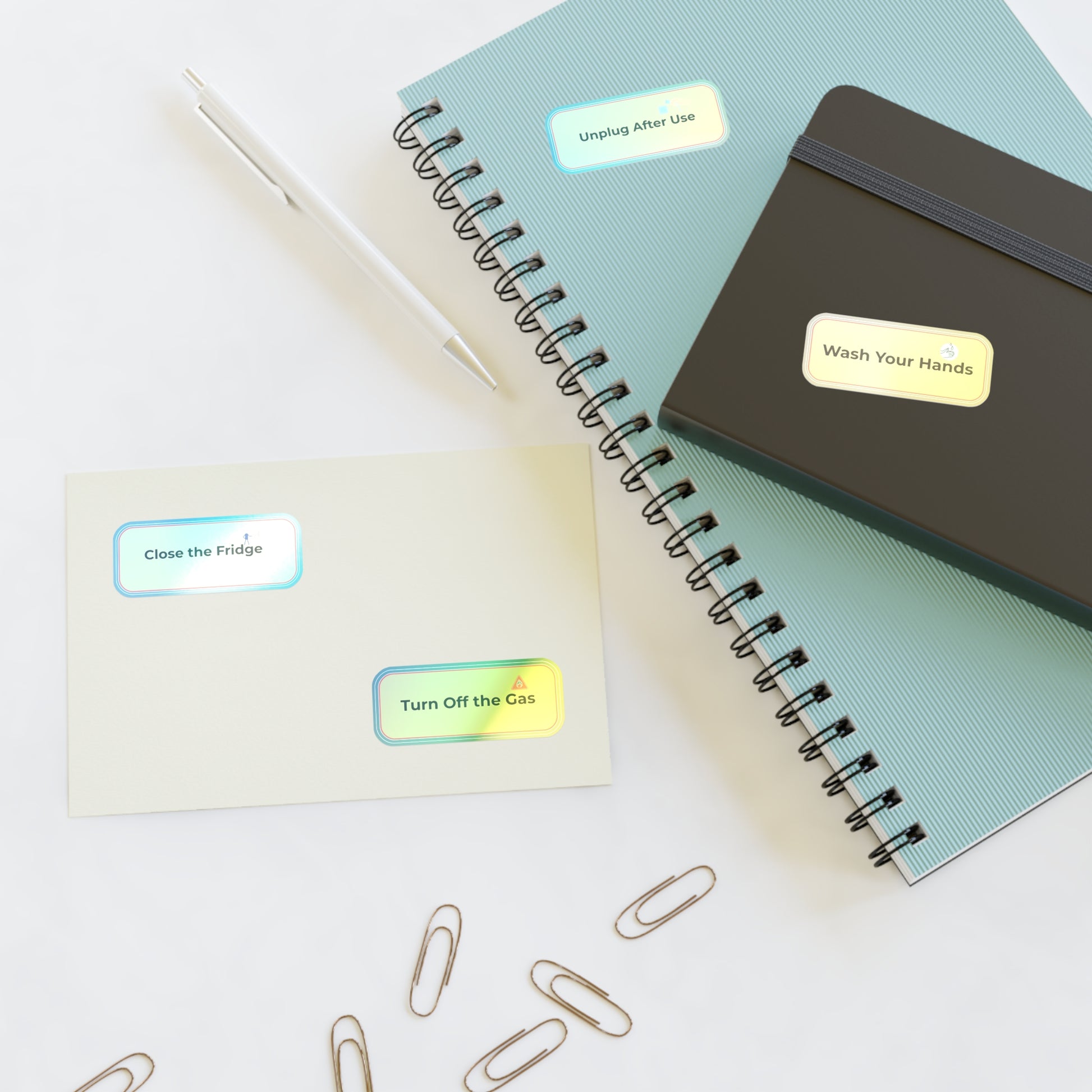Notebooks with reminder stickers on a light surface