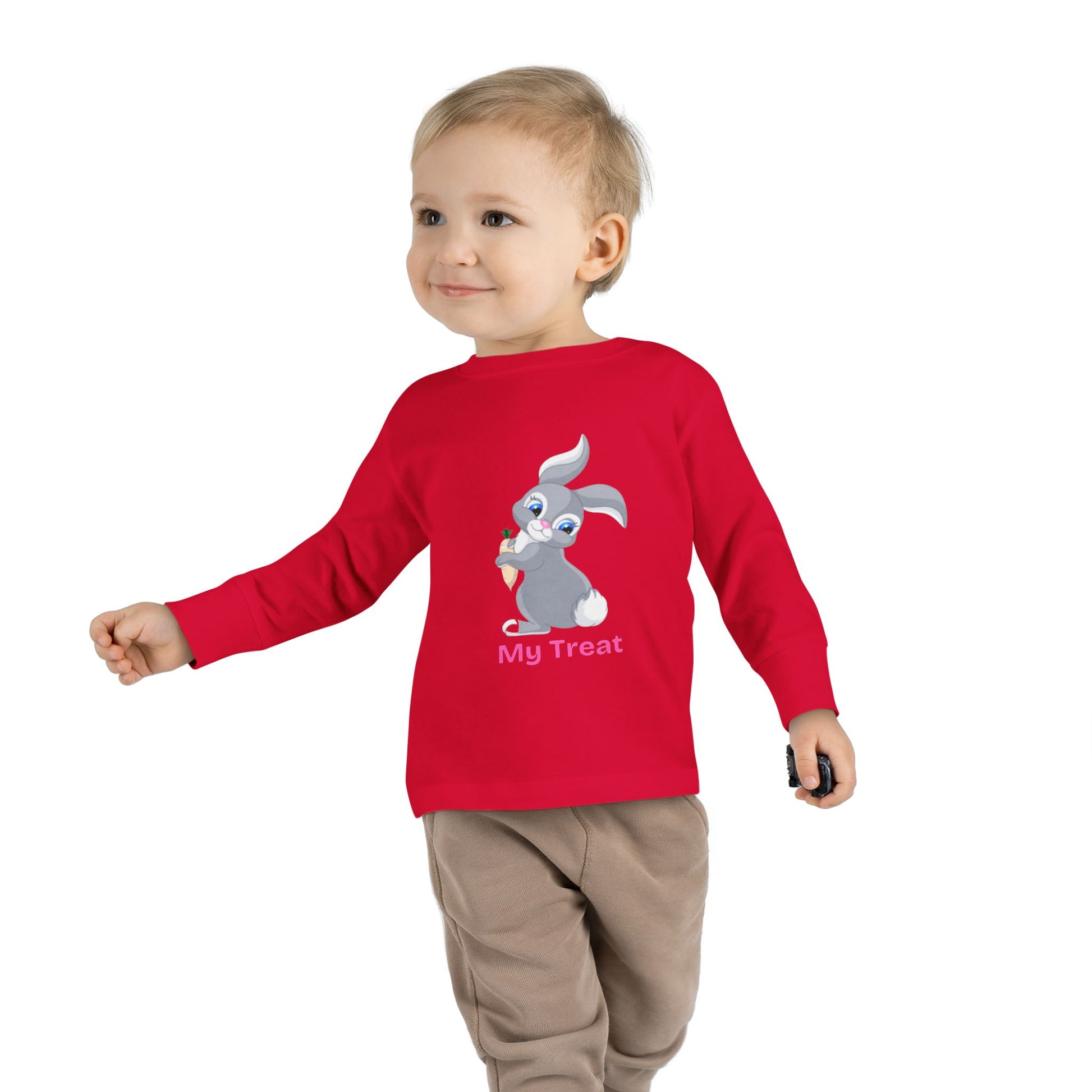 Child wearing a red long-sleeve shirt with a graphic design on a white background