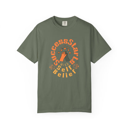 Green t-shirt with motivational quote and graphic on a white background