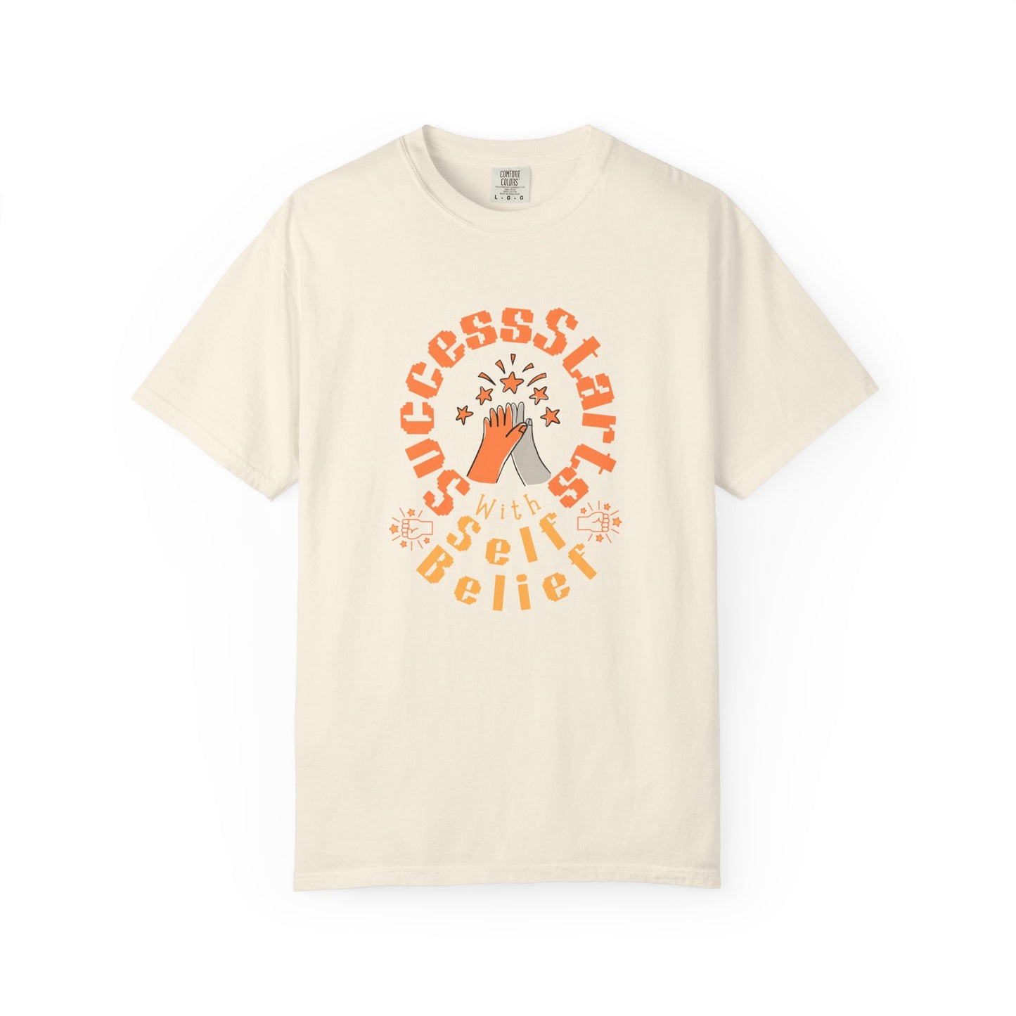 Beige t-shirt with motivational graphic and text on a white background