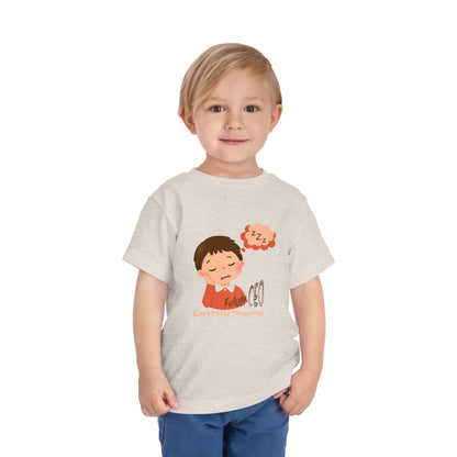 Child wearing a t-shirt with a cartoon design