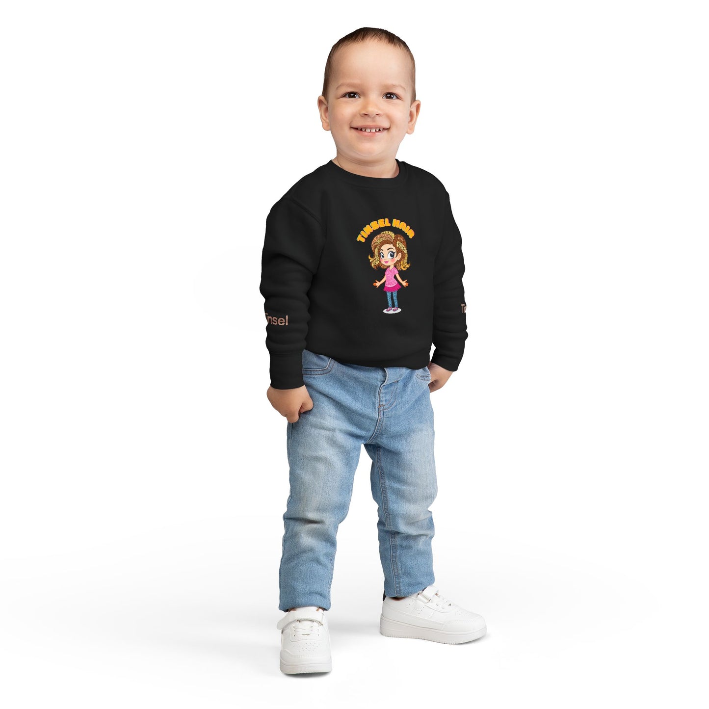Child wearing a black sweatshirt with a cartoon character on a white background