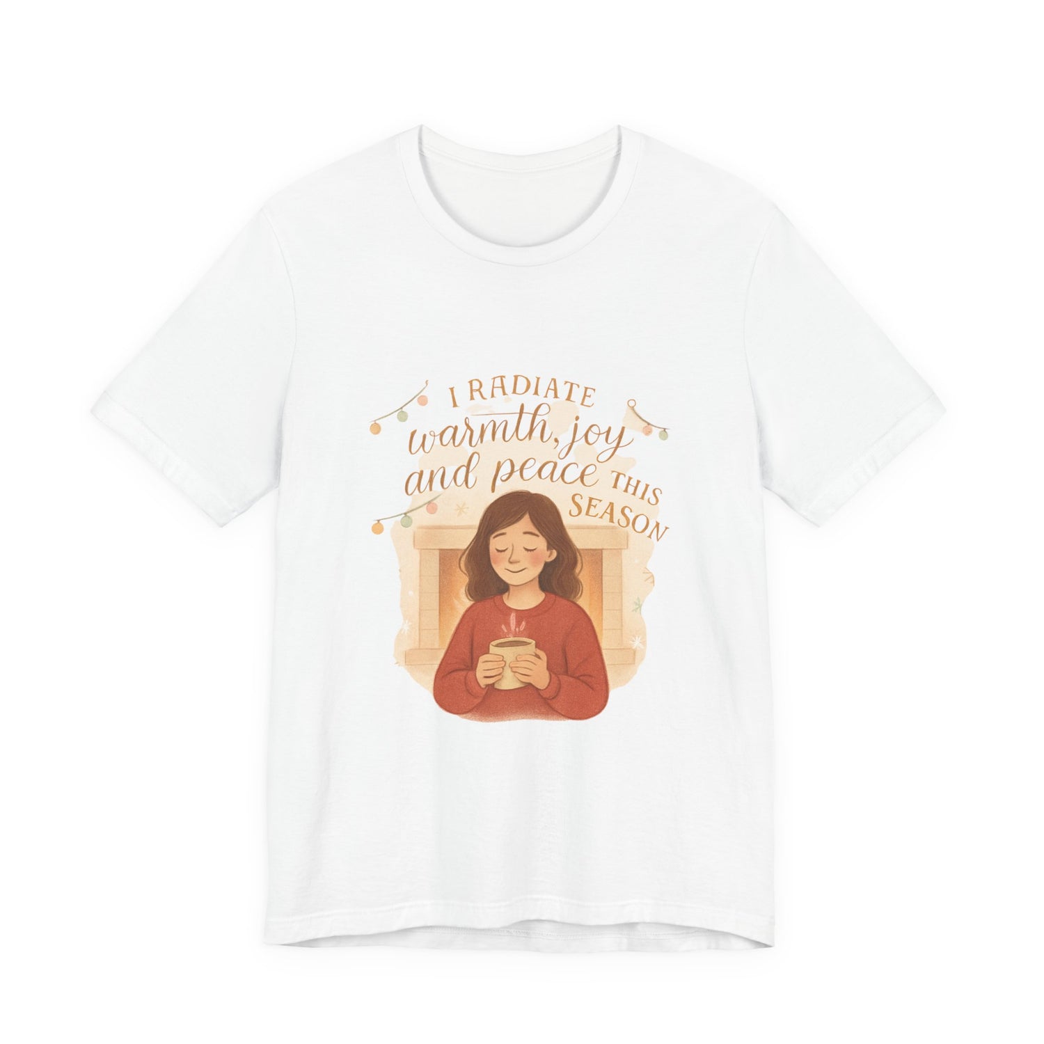 White t-shirt with a graphic of a person holding a mug and text 'I radiate warmth, joy, and peace this season' on a white background.