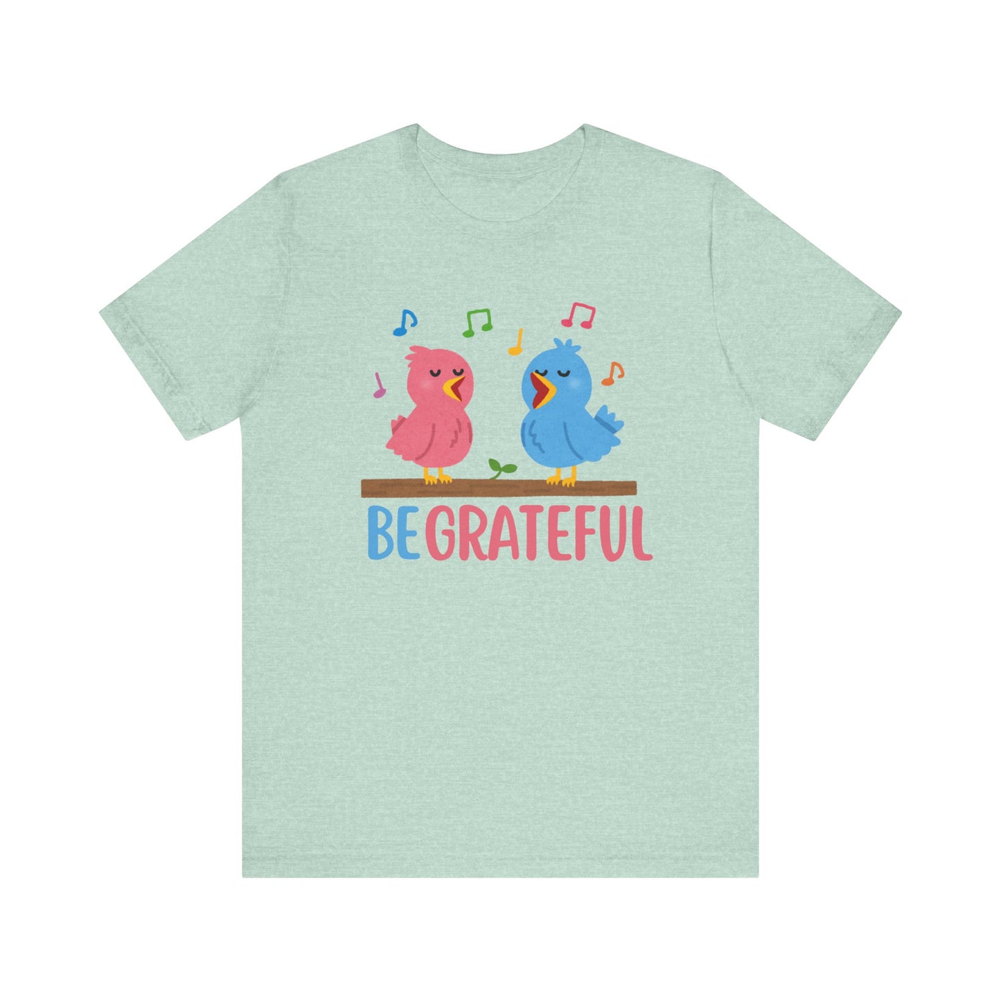 T-shirt with “Be Grateful” text and two bird illustrations – inspirational and nature-themed design for everyday wear.