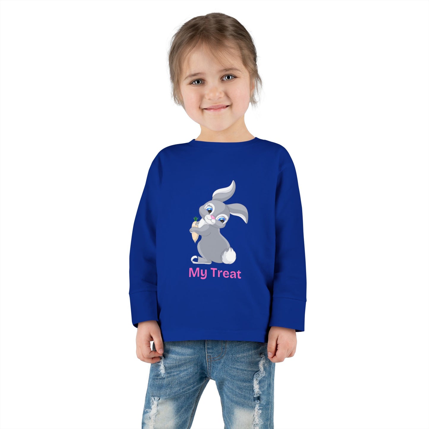 Child wearing a blue long-sleeve shirt with a cartoon character and text on a white background