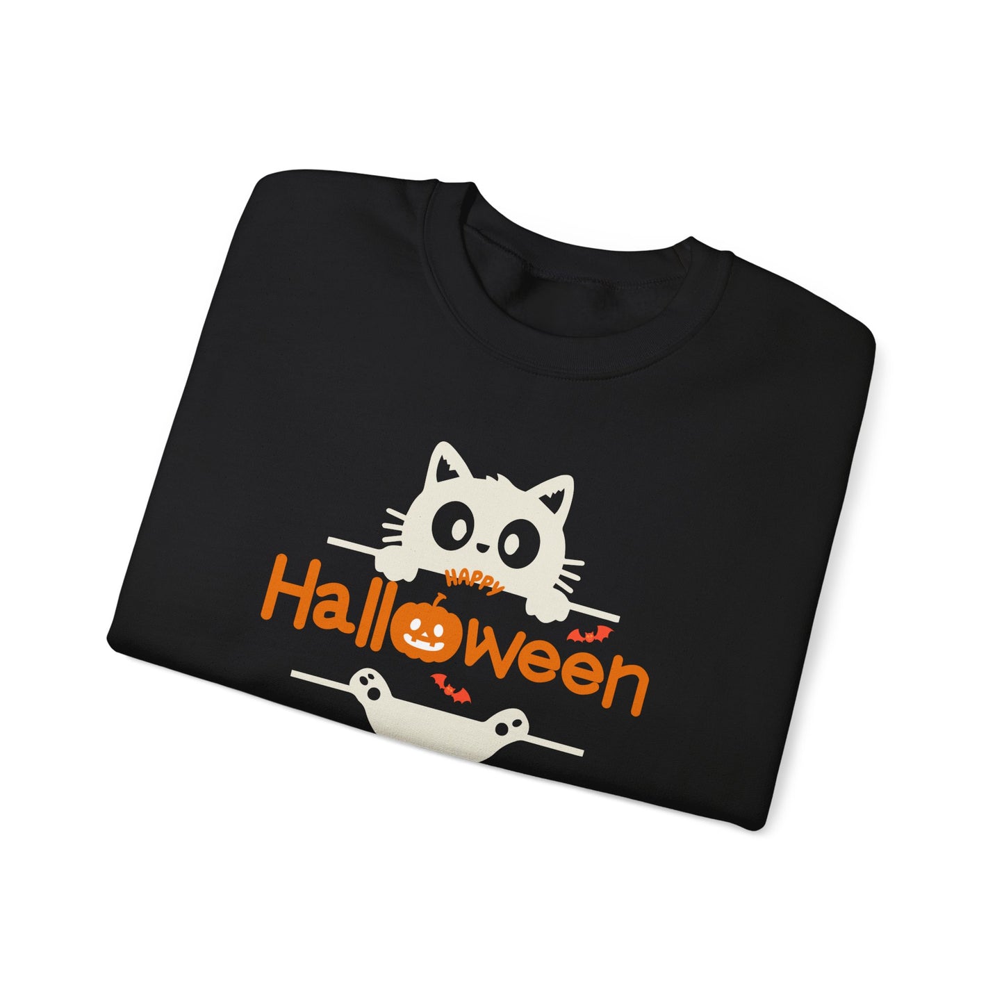 A folded black t-shirt with a cute Halloween graphic featuring a white cartoon cat peeking over orange 'Happy Halloween' text, displayed on a clean white background.