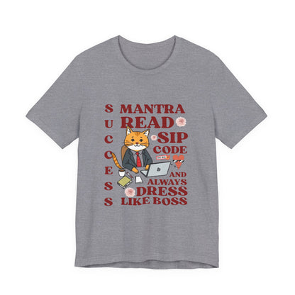 Gray t-shirt with a graphic of a cat and text on a white background