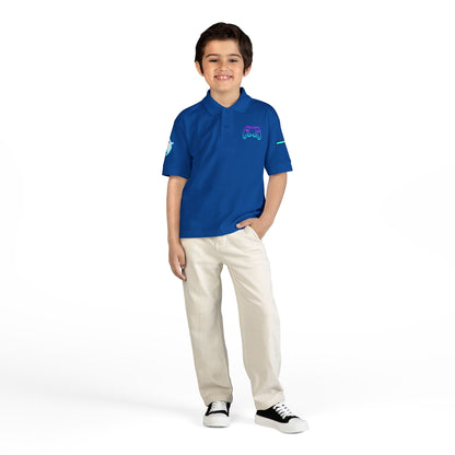 Child wearing a blue polo shirt with a logo on a white background