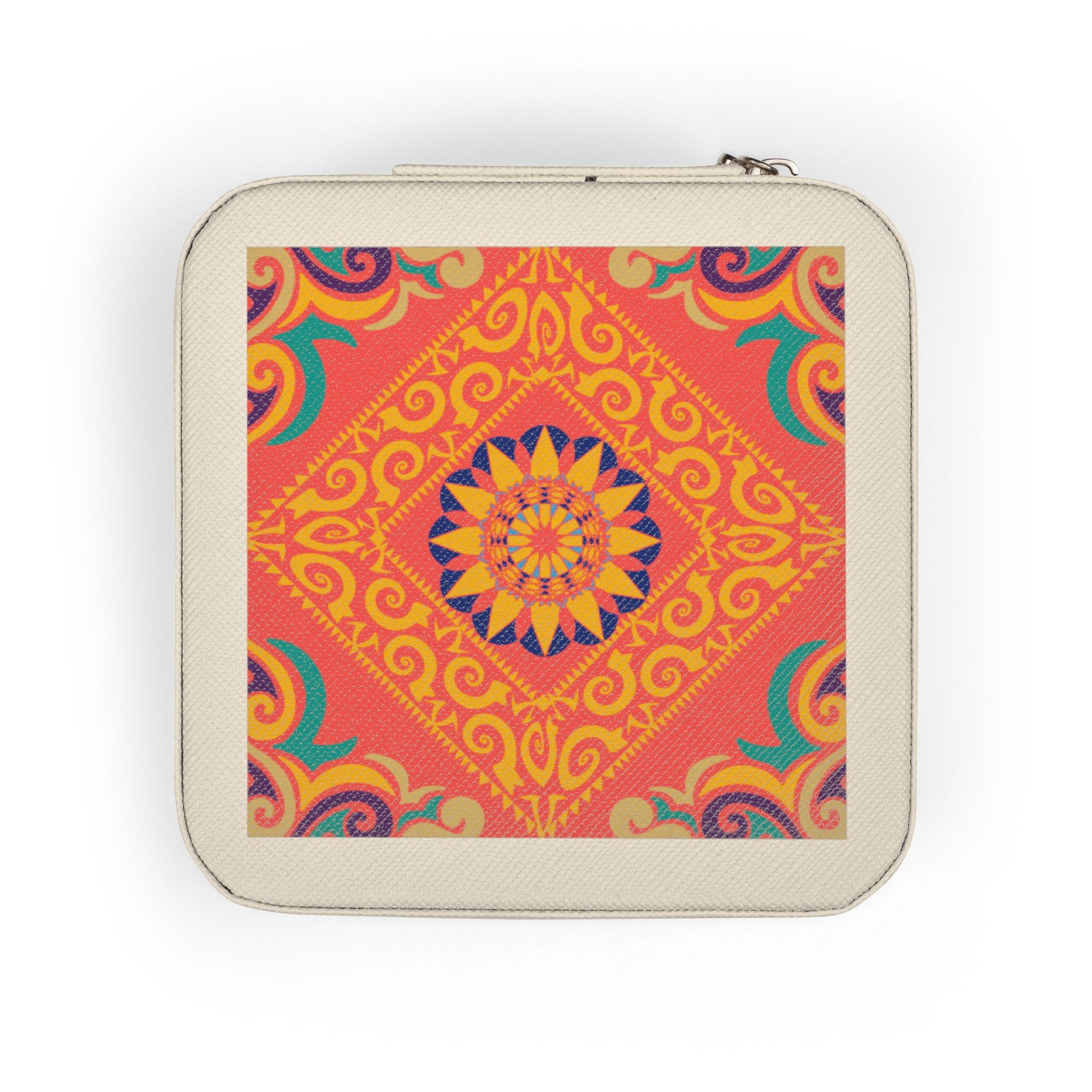 Hand holding a small square travel jewelry case with a colorful pattern on a white background
