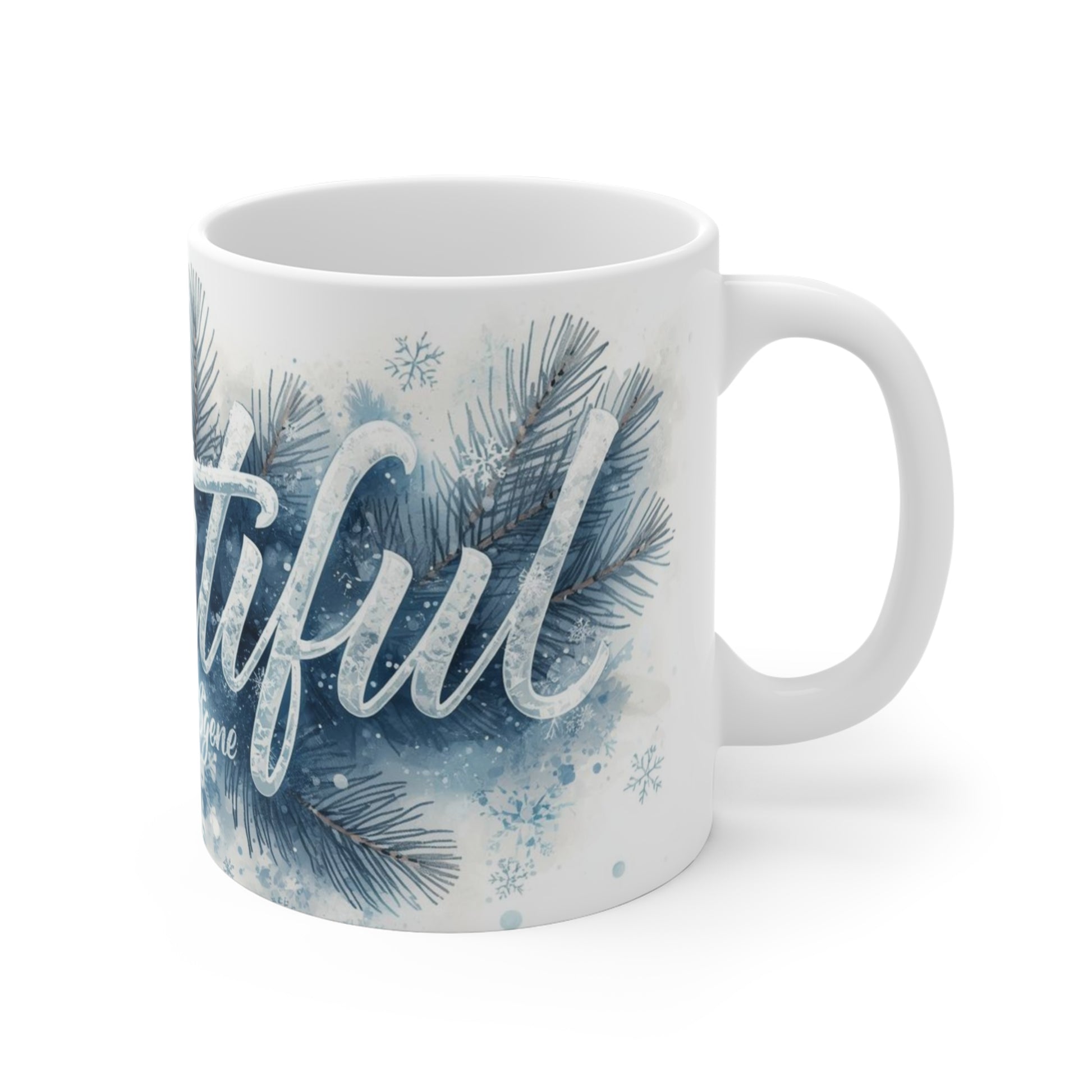 White mug with 'beautiful' text and winter-themed design on a white background