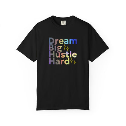 Black t-shirt with 'Dream Big Hustle Hard' text in colorful letters on a white background
