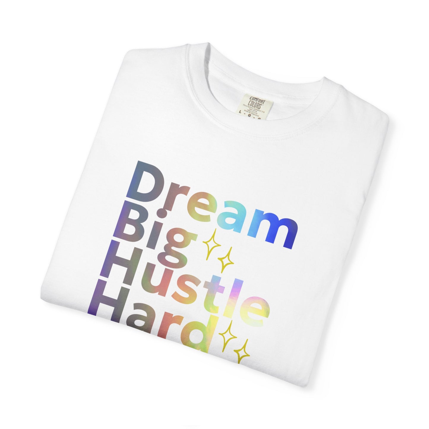 White t-shirt with colorful text 'Dream Big Hustle Hard' on a white background
