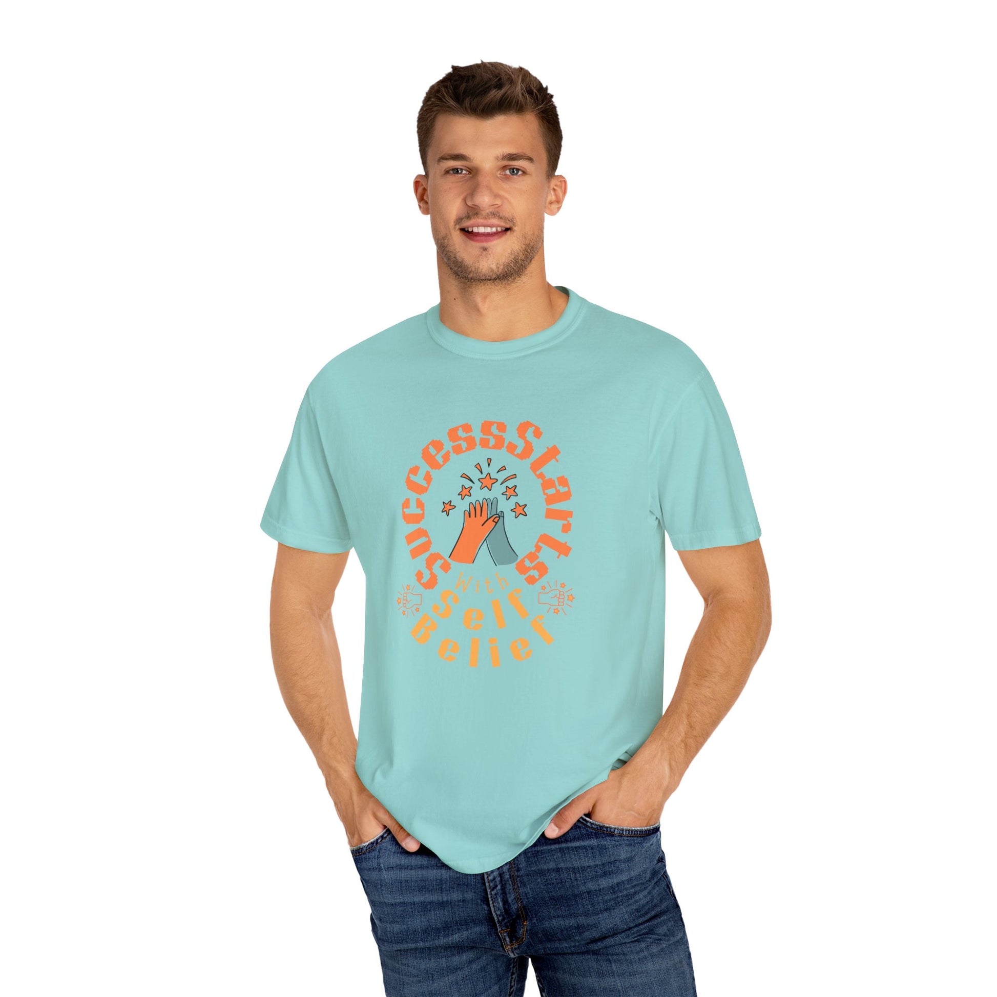 Man wearing a light blue t-shirt with a graphic design on a white background