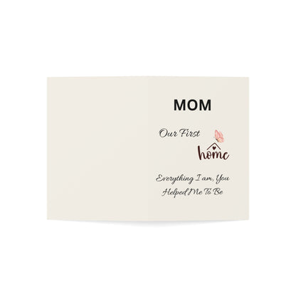 Card with text 'Mom, Our First Home, Everything I am, You Helped Me To Be' on a white background