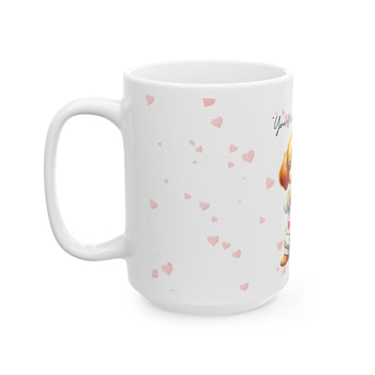 White mug with pink heart patterns on a white background