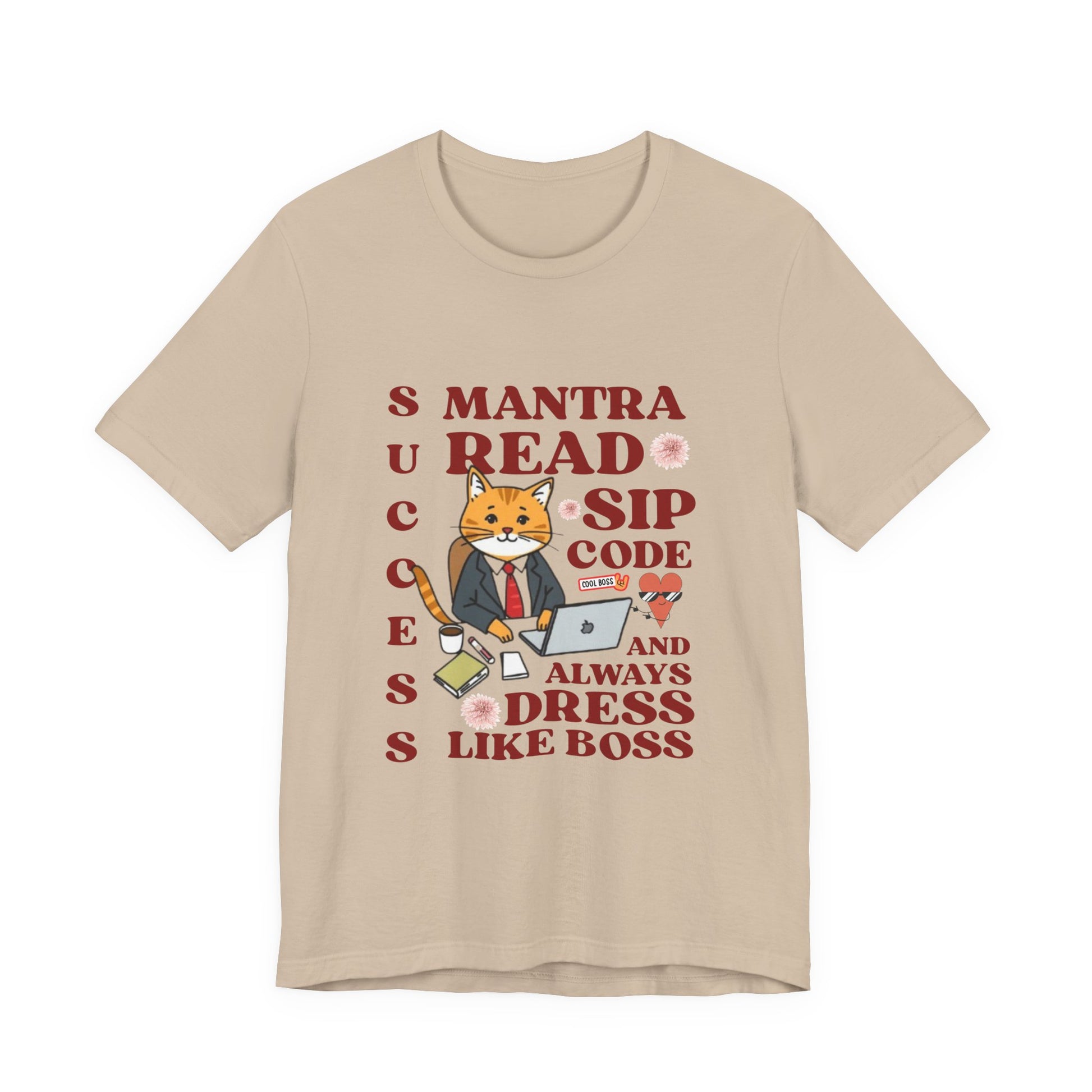 Beige t-shirt with a graphic of a cat and text on a white background