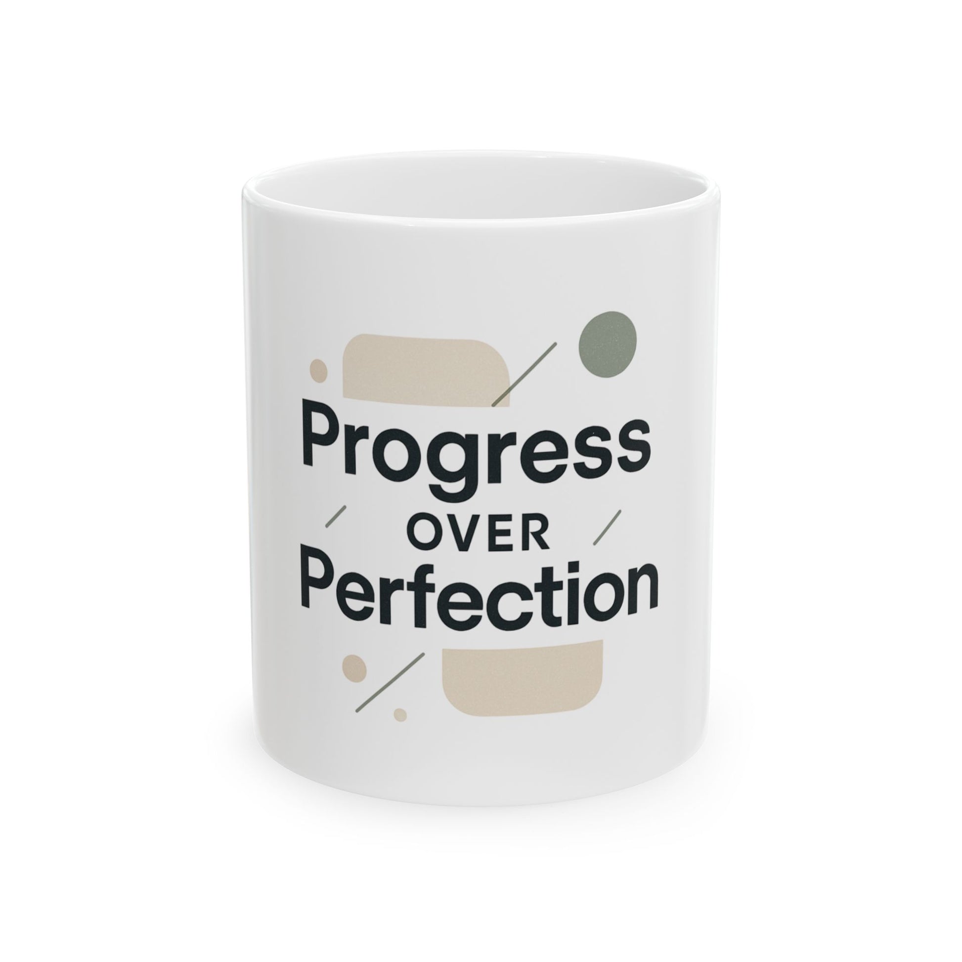 White mug with 'Progress Over Perfection' text on a white background