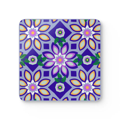 A square coaster with a geometric ad floral pattern in vibrant colors, predominantly purple, with a high-gloss finish.