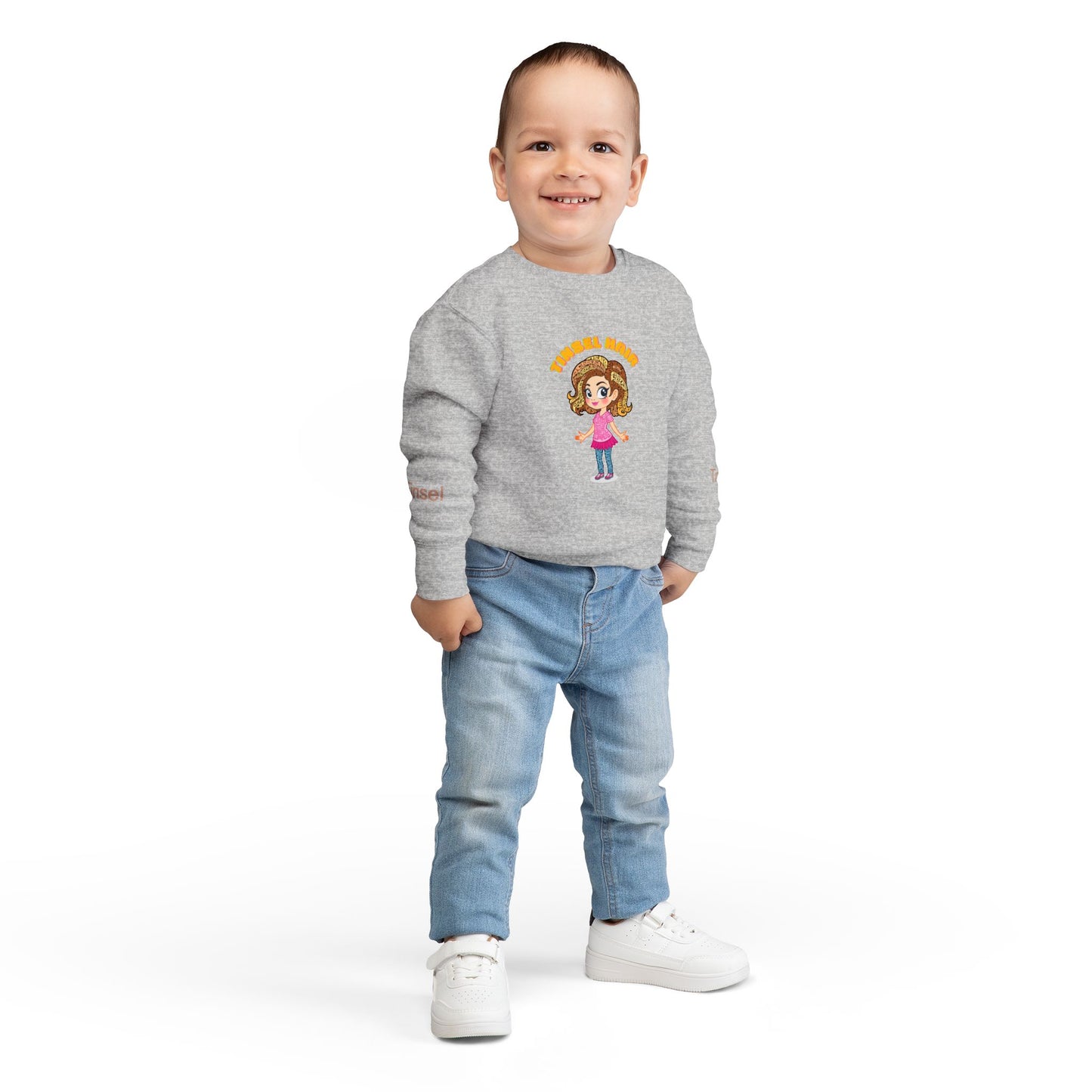 Child wearing a gray sweater with a cartoon character on a white background