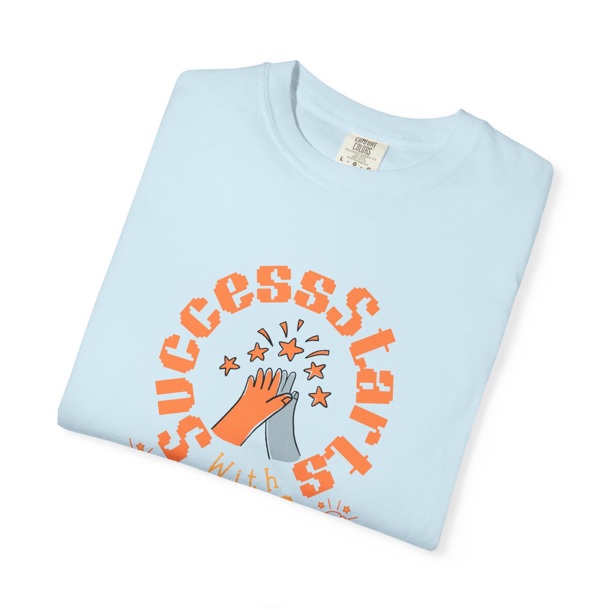 Light blue t-shirt with orange text and graphics on a white background