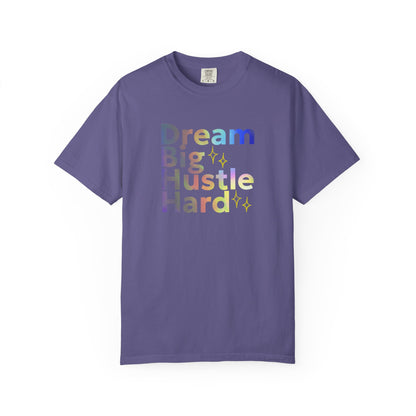 Purple(grape)  t-shirt with motivational text 'Dream Big Hustle Hard' on a white background
