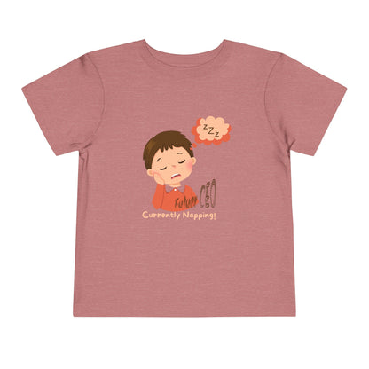 Toddler short sleeve t-shirt with sleeping child illustration and “Future CEO, Currently Napping” text