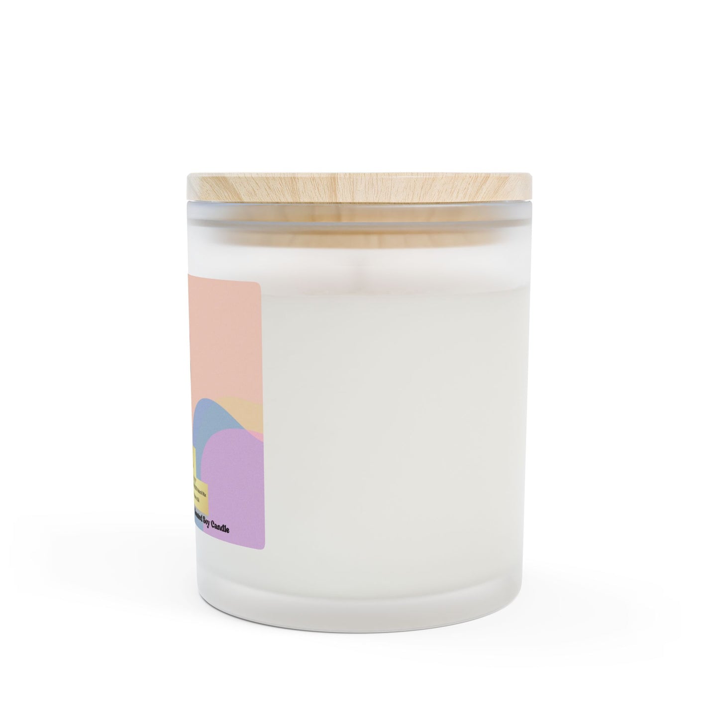 White candle in a glass jar with a wooden lid on a white background