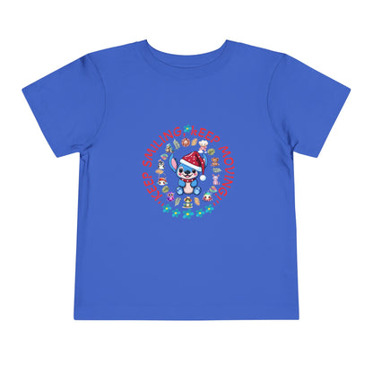 Toddler t-shirt with a cute dog illustration and motivational quote "Keep Smiling Keep Moving" printed in the center.