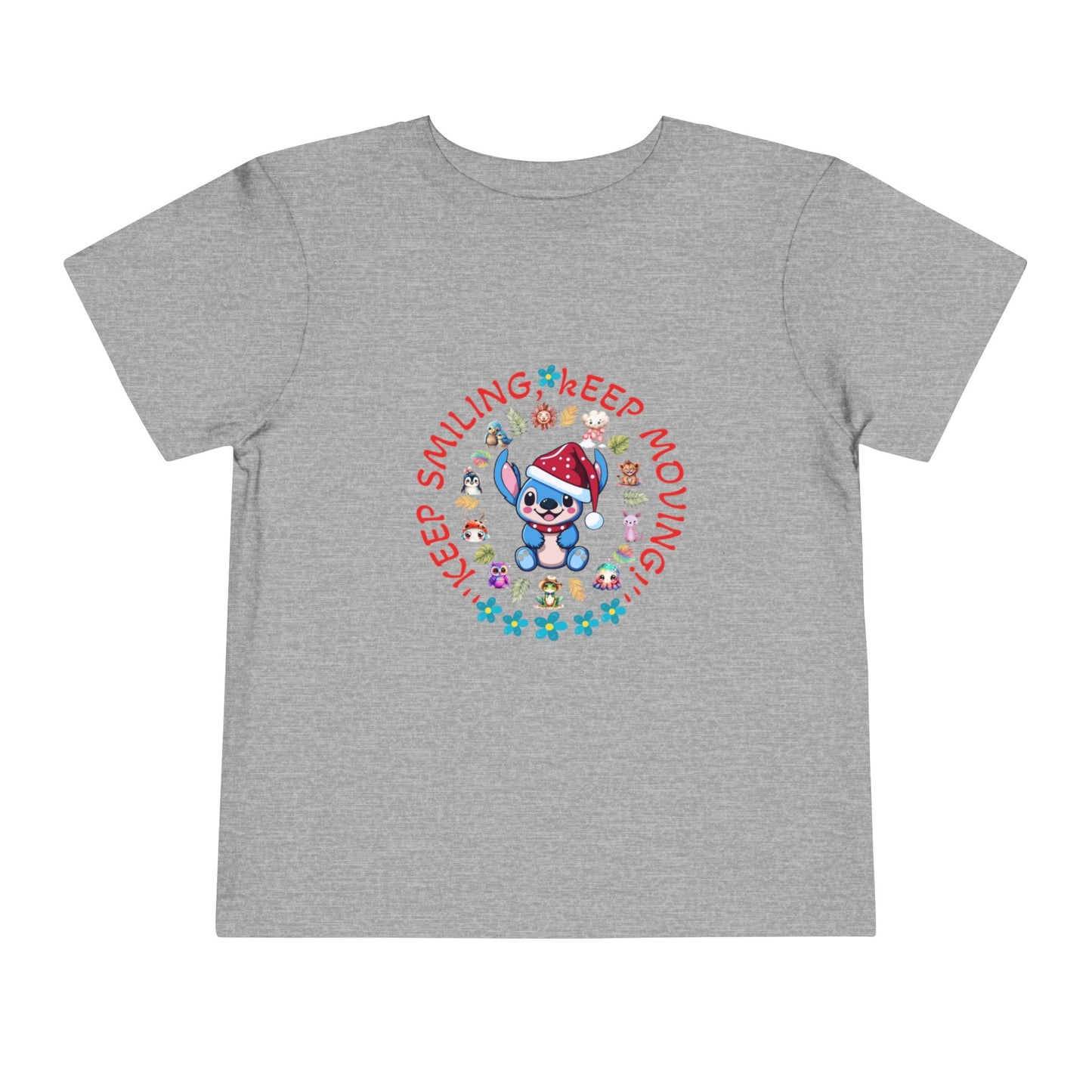 Toddler t-shirt with a cute dog illustration and motivational quote "Keep Smiling Keep Moving" printed in the center.