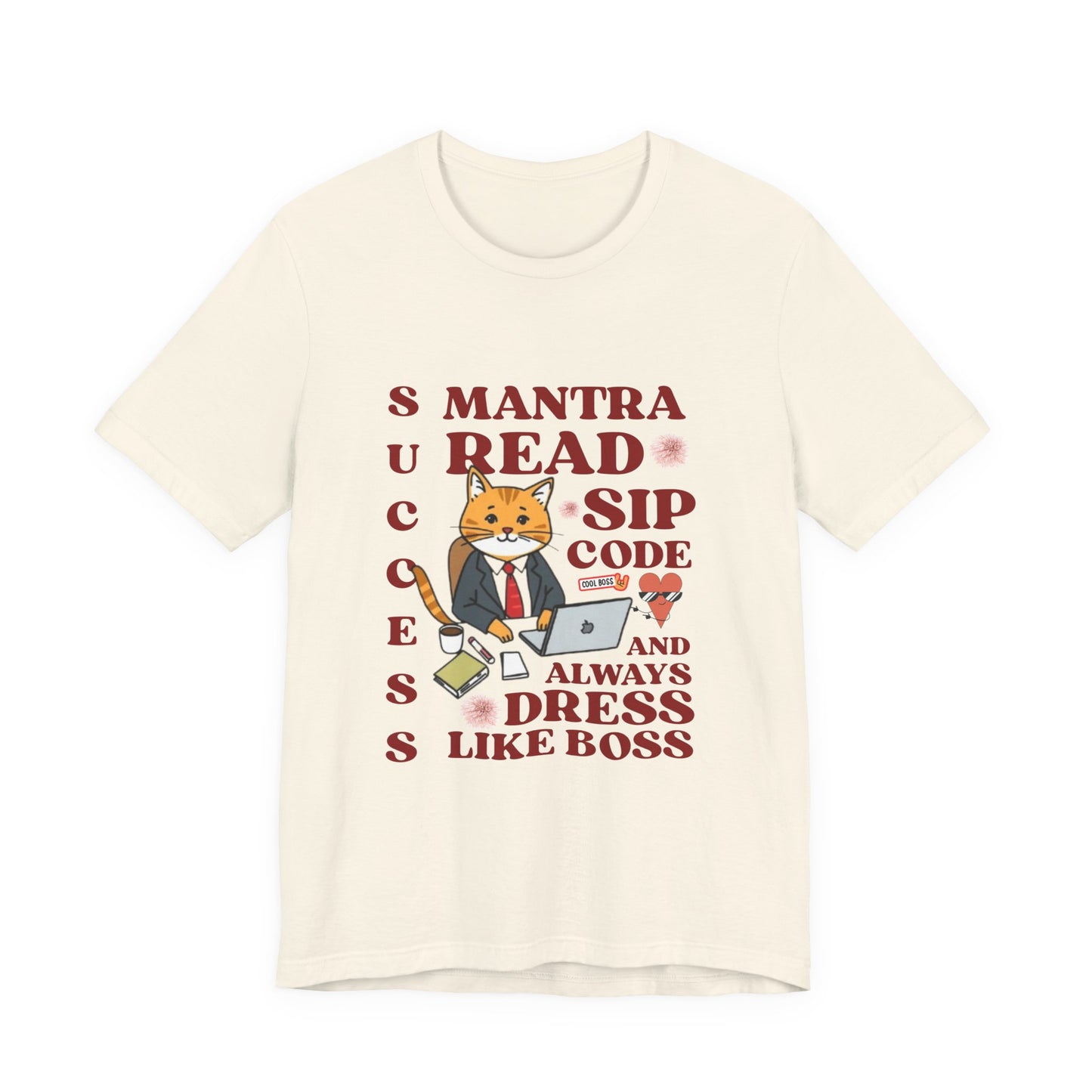 Beige t-shirt with a graphic of a cat in a suit and motivational text on a white background