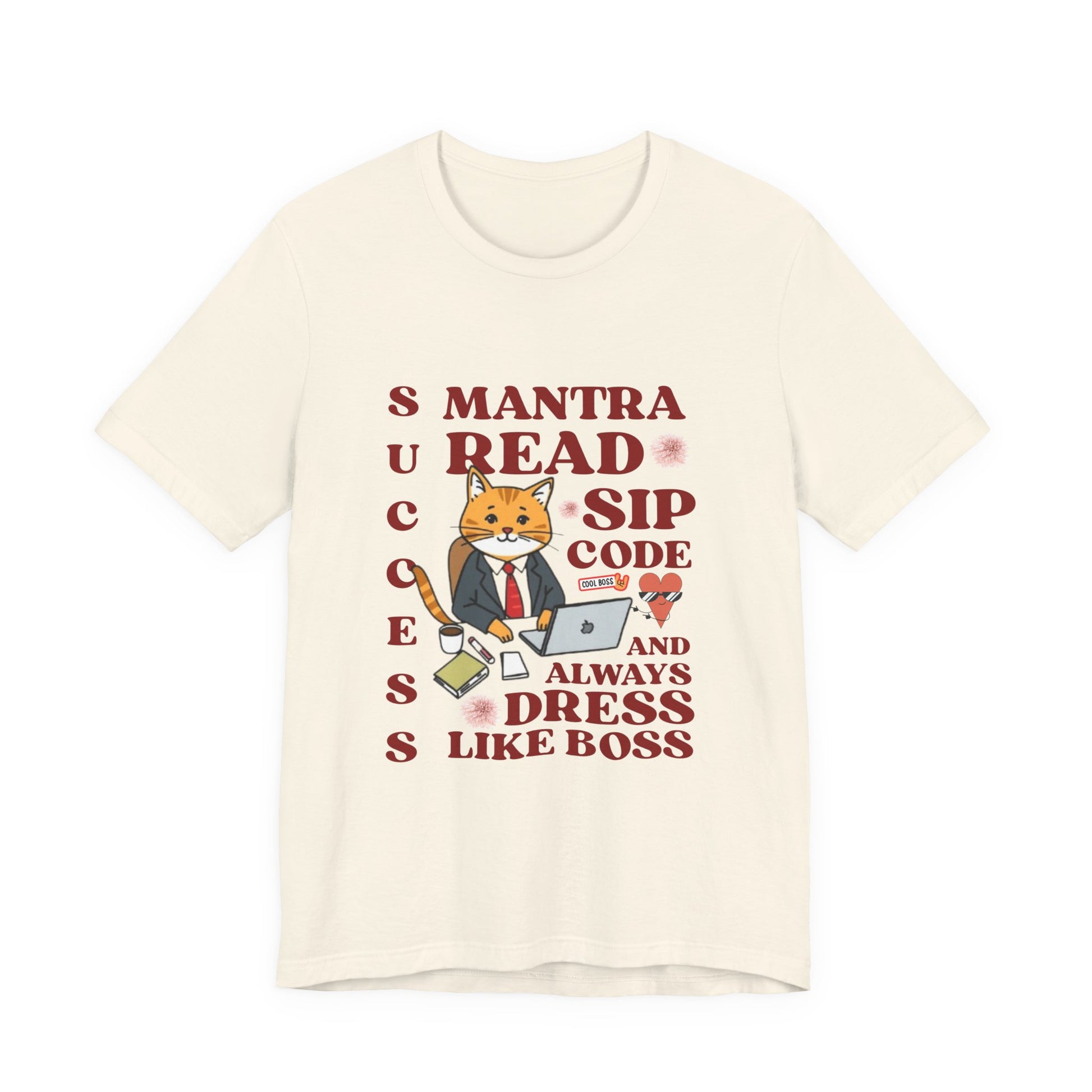 Beige t-shirt with a graphic of a cat in a suit and motivational text on a white background