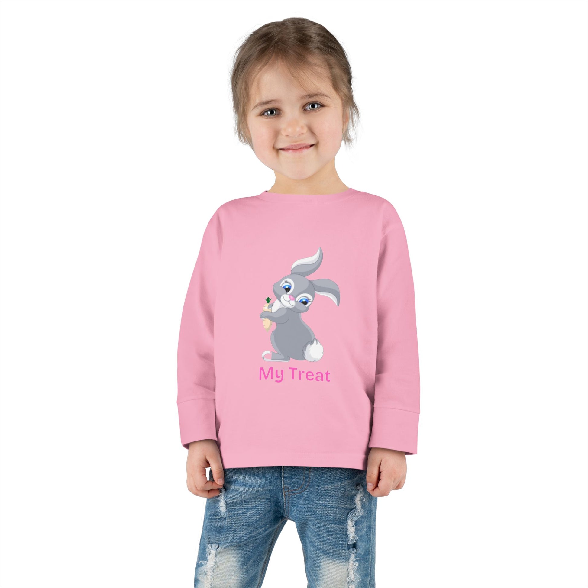 Child wearing a pink sweatshirt with a cartoon bunny design on a white background