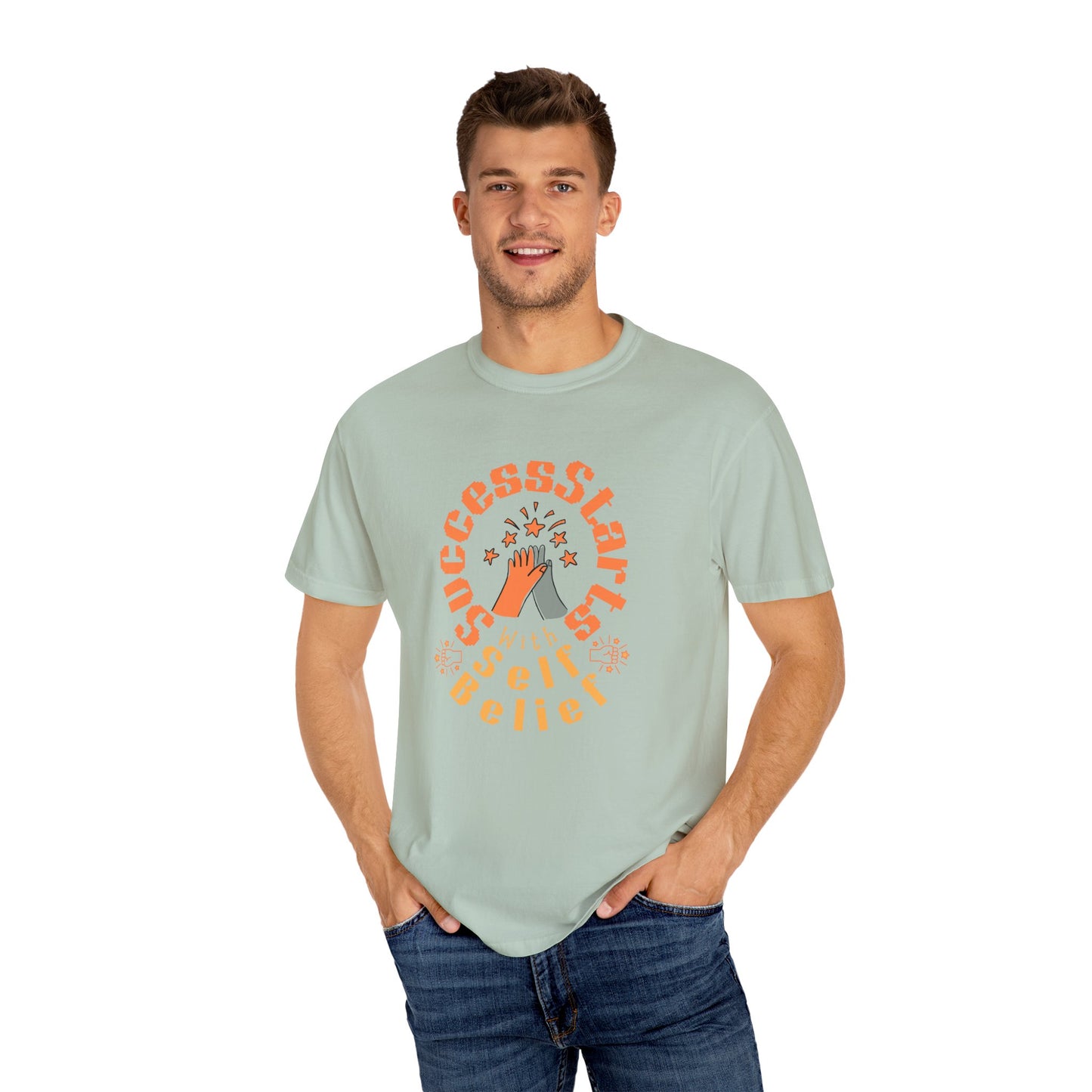 Man wearing a light green t-shirt with a graphic design on a white background
