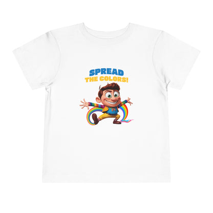 Cartoon boy jumping with rainbow trail and "Spread the Colors!" text on white T-shirt.

