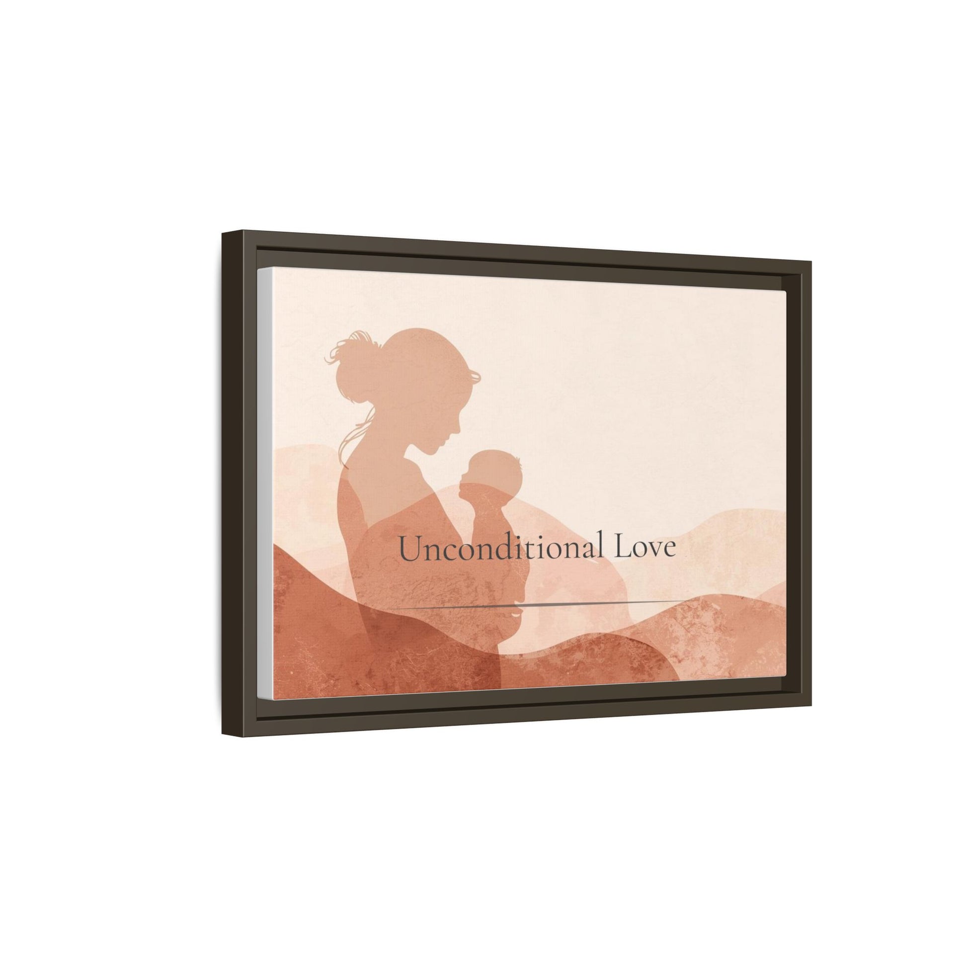 Framed artwork with silhouette of a woman holding a child and text 'Unconditional Love' on a white background
