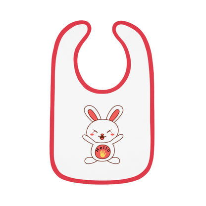 A white baby bib with red contrast trim and a centered graphic of a smiling cartoon rabbit holding a round object.