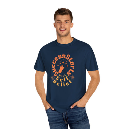 Man wearing a navy blue t-shirt with motivational text design on a white background