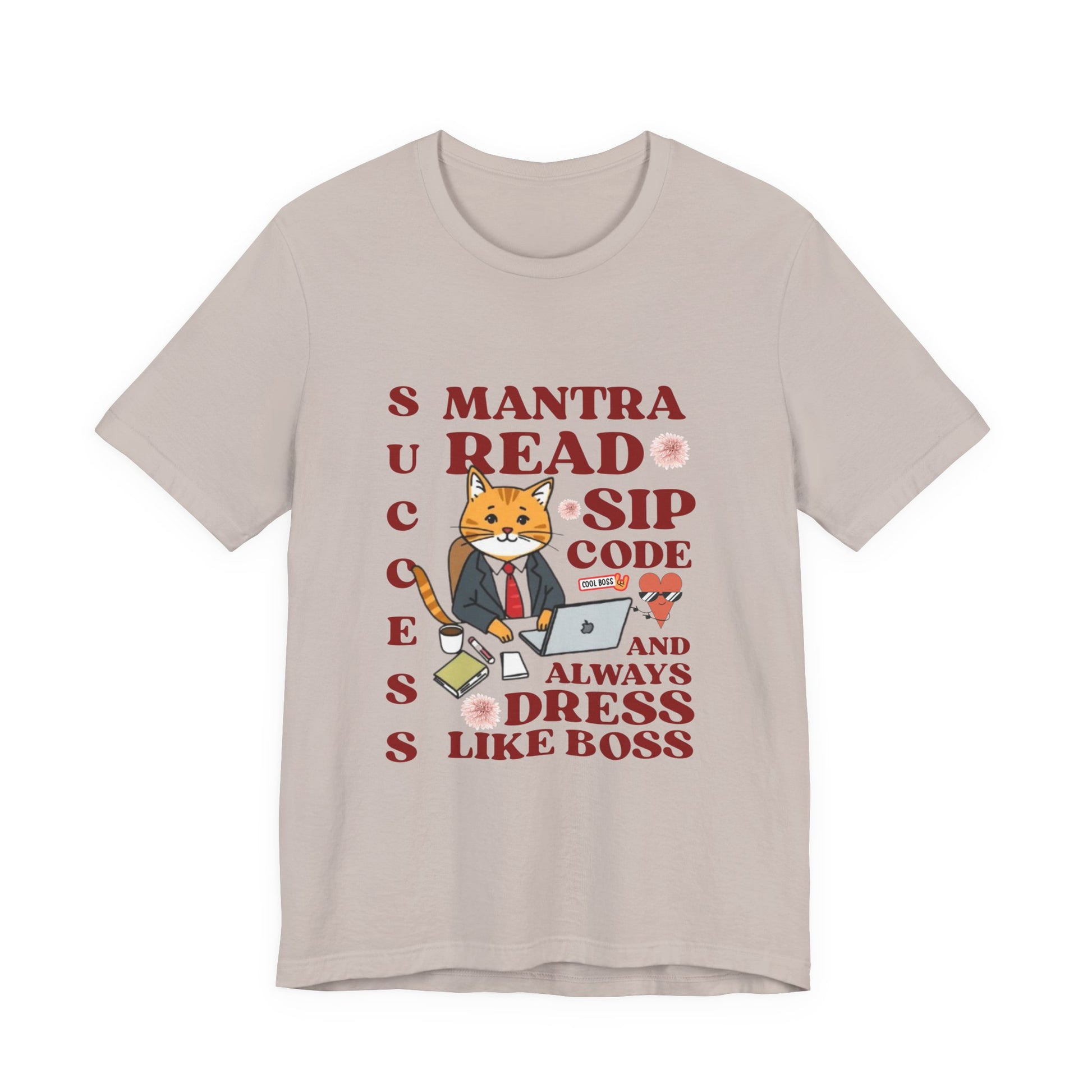Beige t-shirt with a graphic of a cat and text on a white background