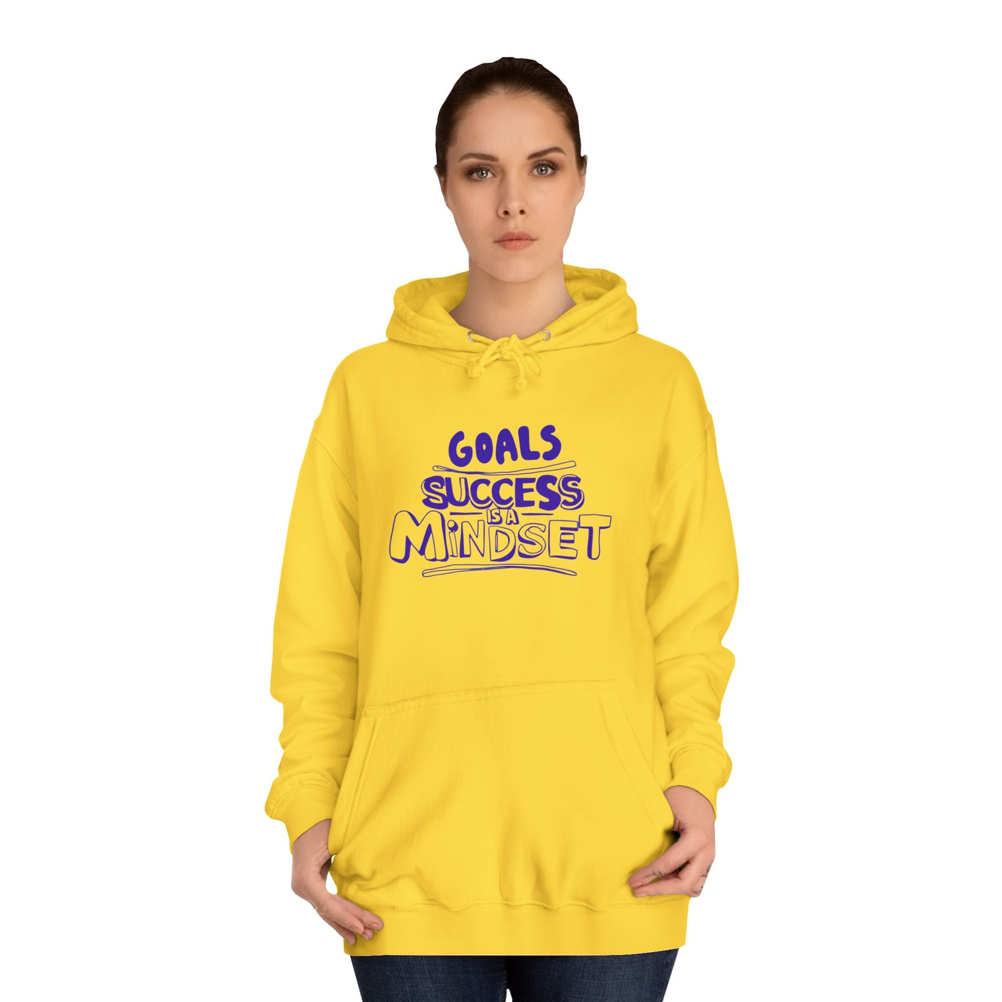 Person wearing a yellow hoodie with text on a white background